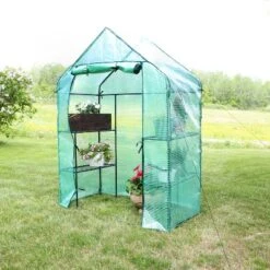 Sunnydaze Decor Sunnydaze Outdoor Portable Tiered Growing Rack Deluxe Walk-In Greenhouse With Roll-Up Door - 4 Shelves - Green -Sunnydaze Store GUEST 01885adc 07b4 4a75 9123 5c8adcf54560