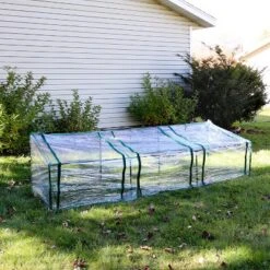 Sunnydaze Decor Sunnydaze Outdoor Portable Slanted Top Plant Shelter Mini Cloche Greenhouse With Zipper Doors - Clear -Sunnydaze Store GUEST 167877ed 4a69 446b b207 86e9ed75512c