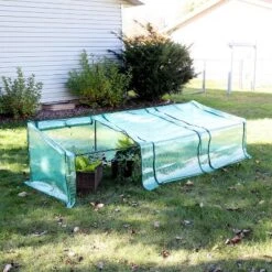 Sunnydaze Decor Sunnydaze Outdoor Portable Slanted Top Plant Shelter Mini Cloche Greenhouse With Zipper Doors - Green -Sunnydaze Store GUEST e54c3759 04be 4f7f 8784 076c28ffbe0c